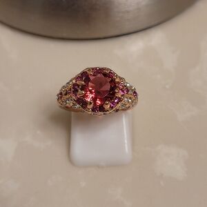 Gold-Tone Ring with Red Center and Pink Halo Accents